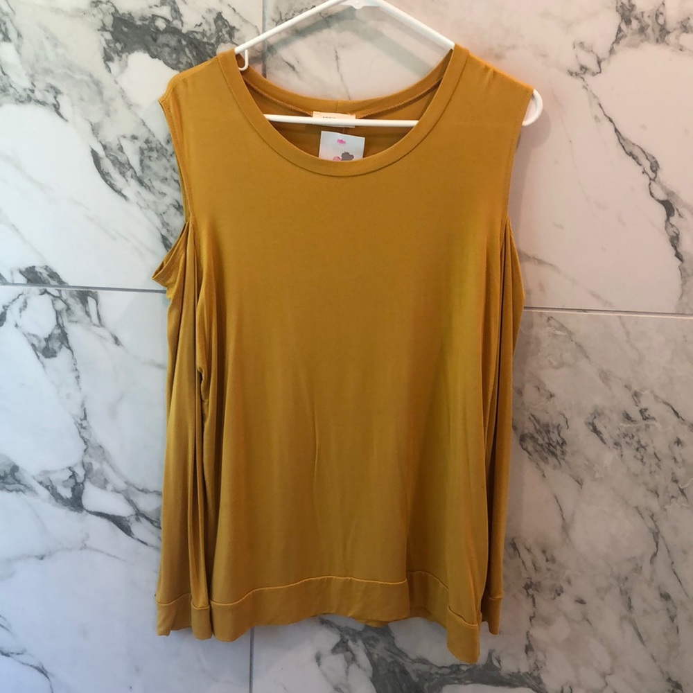 Mustard colored long sleeve, cold shoulder top